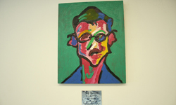 Abstract colorful painting of male face with glasses